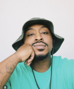 Iman Omari — hip-hop artist profile photo